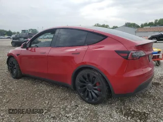 2022 Tesla Model Y Performance with VIN 7SAYGDEF8NF514662, listed as a Copart auction lot 60230305 with 81,926 mi miles and Salvage title. Bid and sale history available at DreamBid. Image 2.