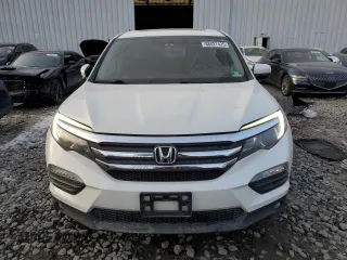 2018 Honda Pilot EX-L with VIN 5FNYF6H5XJB034714, listed as a Copart auction lot 88027425 with 160,652 mi miles and Salvage Title. Bid and sale history available at carsss.com. Image 5.