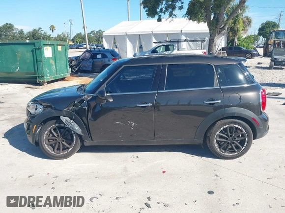 2015 MINI Countryman S with VIN WMWZC3C58FWT04316, listed as a IAAI auction lot 42525698 with 97,046 mi miles and . Bid and sale history available at DreamBid. Image 14.