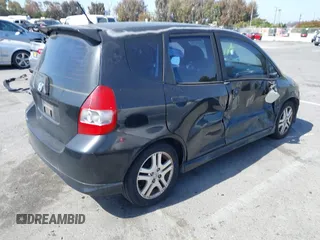 2007 Honda Fit Sport z VIN JHMGD38607S021022, wystawiony jako IAAI lot #42274897 z przebiegiem 277 486 mil mil oraz . Historia ofert i sprzedaży dostępna na DreamBid. Obrazek 4.