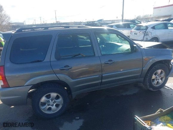 2002 Mazda Tribute LX with VIN 4F2YU08142KM18539, listed as a IAAI auction lot 41742104 with 230,254 mi miles. Bid and sale history available at carsss.com. Image 13.