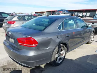 2013 Volkswagen Passat SE with VIN 1VWBP7A32DC144639, listed as a IAAI auction lot 41337338 with 147,878 mi miles. Bid and sale history available at carsss.com. Image 4.