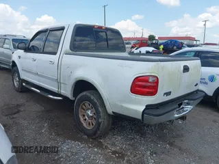 2001 Ford F-150 XLT with VIN 1FTRW08L81KD86516, listed as a IAAI auction lot 42689615 with 320,437 mi miles and . Bid and sale history available at DreamBid. Image 3.