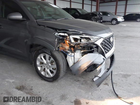 2021 Hyundai Tucson Value z VIN KM8J33A47MU309988, wystawiony jako IAAI lot #41749644 z przebiegiem 61 197 mil mil oraz . Historia ofert i sprzedaży dostępna na DreamBid. Obrazek 6.