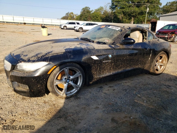 2011 BMW Z4 sDrive35i with VIN WBALM7C5XBE383093, listed as a Copart auction lot 74487034 with NaN miles and Salvage Title. Bid and sale history available at carsss.com. Image 1.