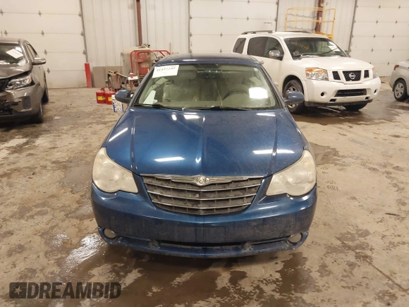2010 Chrysler Sebring Limited z VIN 1C3BC6EV4AN122733, wystawiony jako IAAI lot #41420349 z przebiegiem 128 164 mil mil oraz . Historia ofert i sprzedaży dostępna na DreamBid. Obrazek 6.