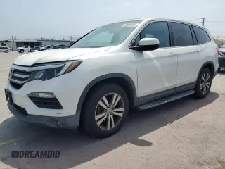 2016 Honda Pilot EX-L with VIN 5FNYF5H71GB026876, listed as a Copart auction lot 60000205 with 136,297 mi miles and Salvage title. Bid and sale history available at DreamBid. Image 1.