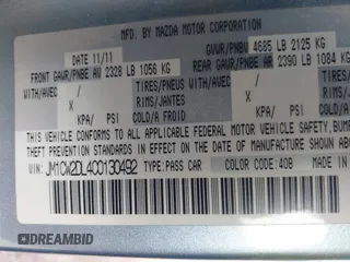 2012 Mazda Mazda5 Grand Touring with VIN JM1CW2DL4C0130492, listed as a IAAI auction lot 41957488 with 154,239 mi miles. Bid and sale history available at carsss.com. Image 9.