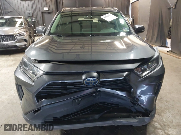2019 Toyota RAV4 Hybrid LE with VIN JTMMWRFV8KD036053, listed as a IAAI auction lot 42502103 with 94,113 mi miles and . Bid and sale history available at DreamBid. Image 6.