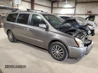 2011 Kia Sedona EX with VIN KNDMH4C79B6398495, listed as a Copart auction lot 47064174 with 169,328 mi miles and Salvage Title. Bid and sale history available at carsss.com. Image 4.