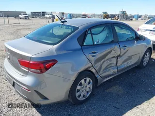 2023 Kia Rio S with VIN 3KPA24AD5PE524320, listed as a IAAI auction lot 41881897 with 48,615 mi miles. Bid and sale history available at carsss.com. Image 4.