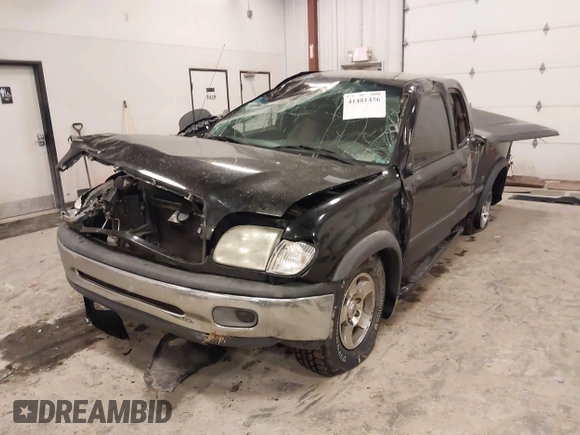 2001 Toyota Tundra SR5 with VIN 5TBRT34131S169696, listed as a IAAI auction lot 41481456 with 215,679 mi miles and . Bid and sale history available at DreamBid. Image 17.