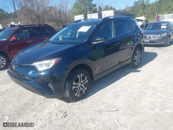 2017 Toyota RAV4 LE with VIN JTMZFREV9HJ719316, listed as a IAAI auction lot 41497253 with 98,357 mi miles. Bid and sale history available at carsss.com. Image 17.