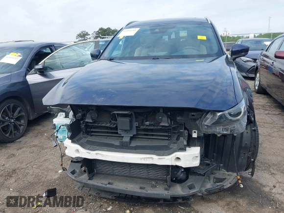 2021 Mazda CX-9 Carbon Edition with VIN JM3TCADY1M0516505, listed as a IAAI auction lot 42016644 with 50,900 mi miles and . Bid and sale history available at carsss.com. Image 13.