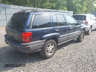 2004 Jeep Grand Cherokee Laredo with VIN 1J4GW48NX4C405558, listed as a IAAI auction lot 42440639 with 197,457 mi miles and . Bid and sale history available at DreamBid. Image 4.