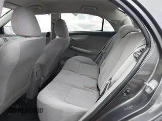 2011 Toyota Corolla L with VIN JTDBU4EE3BJ090749, listed as a IAAI auction lot 42106633 with 209,824 mi miles. Bid and sale history available at carsss.com. Image 8.
