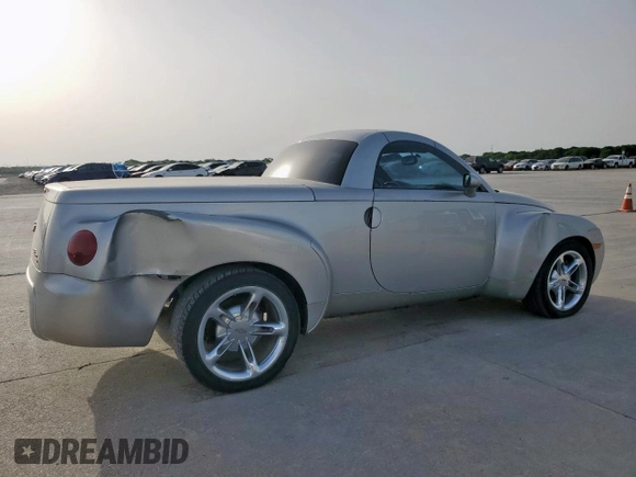 2005 Chevrolet SSR LS z VIN 1GCES14H75B114899, wystawiony jako Copart lot #56712515 z przebiegiem 99 359 mil mil oraz Szkoda całkowita • Salvage title. Historia ofert i sprzedaży dostępna na DreamBid. Obrazek 3.