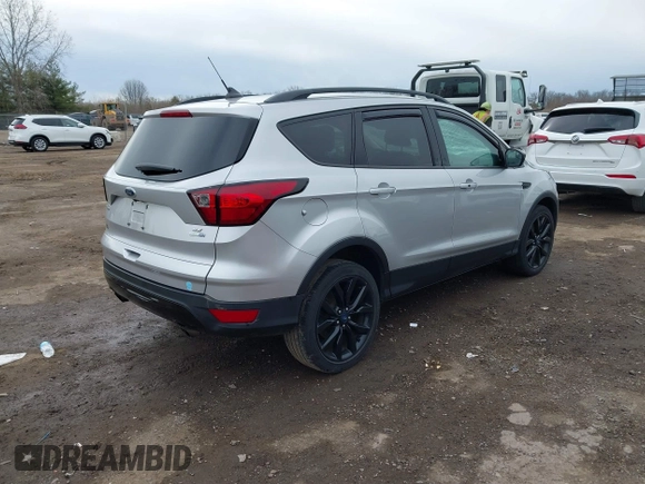 2019 Ford Escape SE with VIN 1FMCU9GD7KUB29309, listed as a IAAI auction lot 41876535 with 90,688 mi miles. Bid and sale history available at carsss.com. Image 4.