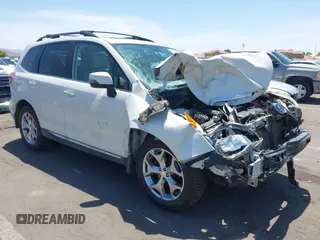 2015 Subaru Forester Touring with VIN JF2SJAWC8FH588321, listed as a IAAI auction lot 42689364 with 103,642 mi miles and . Bid and sale history available at DreamBid. Image 1.