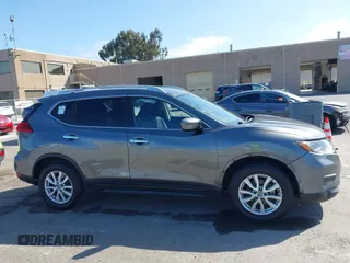 2017 Nissan Rogue S with VIN JN8AT2MT1HW153012, listed as a IAAI auction lot 42497630 with 169,329 mi miles and . Bid and sale history available at DreamBid. Image 13.