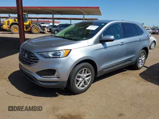 2021 Ford Edge SEL z VIN 2FMPK4J98MBA50772, wystawiony jako IAAI lot #42224052 z przebiegiem 76 061 mil mil oraz . Historia ofert i sprzedaży dostępna na DreamBid. Obrazek 17.