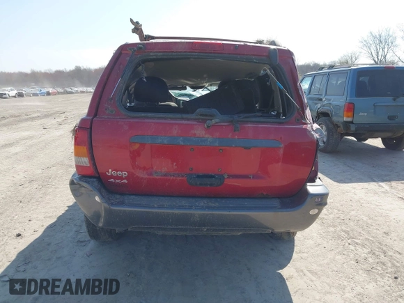 2004 Jeep Grand Cherokee Laredo z VIN 1J4GW48S34C289321, wystawiony jako IAAI lot #42062819 z przebiegiem Nie podano mil oraz . Historia ofert i sprzedaży dostępna na DreamBid. Obrazek 16.