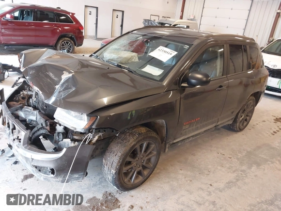 2016 Jeep Compass Sport with VIN 1C4NJDBB3GD805857, listed as a IAAI auction lot 42330519 with 135,578 mi miles and . Bid and sale history available at DreamBid. Image 2.