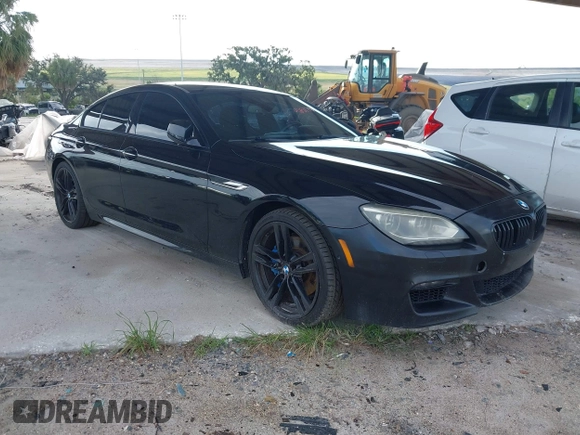 2014 BMW 6 Series 650i z VIN WBA6B2C57ED129681, wystawiony jako IAAI lot #42517803 z przebiegiem 208 644 mil mil oraz . Historia ofert i sprzedaży dostępna na DreamBid. Obrazek 1.