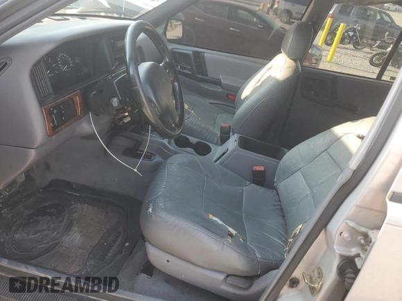1998 Jeep Grand Cherokee Laredo with VIN 1J4GZ58S8WC301754, listed as a Copart auction lot 69698144 with 205,739 mi miles and Non Repairable. Bid and sale history available at carsss.com. Image 7.