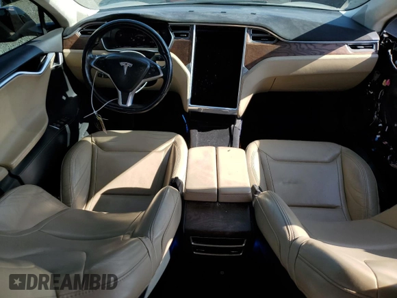 2016 Tesla Model S 90D with VIN 5YJSA1E20GF169954, listed as a Copart auction lot 61974475 with 124,560 mi miles and Salvage title. Bid and sale history available at DreamBid. Image 8.