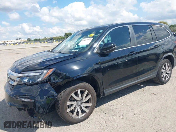 2020 Honda Pilot EX-L with VIN 5FNYF5H59LB014225, listed as a IAAI auction lot 41689776 with 90,994 mi miles. Bid and sale history available at carsss.com. Image 2.
