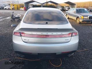 2015 Lincoln MKZ Hybrid z VIN 3LN6L2LU7FR614253, wystawiony jako IAAI lot #40872678 z przebiegiem 185 637 mil mil oraz . Historia ofert i sprzedaży dostępna na DreamBid. Obrazek 16.