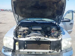 2005 Dodge Dakota SLT with VIN 1D7HE42K95S337682, listed as a IAAI auction lot 41905755 with 145,095 mi miles and . Bid and sale history available at carsss.com. Image 10.
