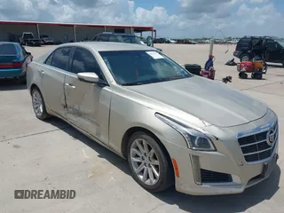 2014 Cadillac CTS Luxury RWD z VIN 1G6AR5SX8E0142754, wystawiony jako IAAI lot #42523727 z przebiegiem 119 632 mil mil oraz . Historia ofert i sprzedaży dostępna na DreamBid. Obrazek 1.