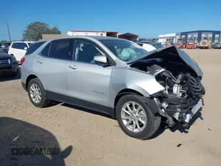 2020 Chevrolet Equinox LT z VIN 2GNAXKEV7L6145717, wystawiony jako IAAI lot #41542866 z przebiegiem 11 669 mil mil oraz . Historia ofert i sprzedaży dostępna na DreamBid. Obrazek 1.