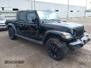 2023 Jeep Gladiator Overland with VIN 1C6HJTFG6PL555153, listed as a IAAI auction lot 42210878 with 40,576 mi miles and . Bid and sale history available at DreamBid. Image 1.