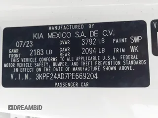 2023 Kia Forte LXS with VIN 3KPF24AD7PE669204, listed as a IAAI auction lot 41915744 with 17,413 mi miles and . Bid and sale history available at DreamBid. Image 9.