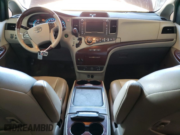 2012 Toyota Sienna XLE AAS with VIN 5TDYK3DC5CS187675, listed as a Copart auction lot 55211635 with 328,972 mi miles and Clean Title. Bid and sale history available at DreamBid. Image 8.