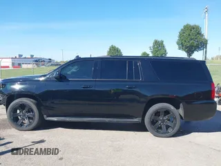 2019 Chevrolet Suburban Premier with VIN 1GNSKJKJ1KR100936, listed as a IAAI auction lot 40489121 with 97,884 mi miles and . Bid and sale history available at DreamBid. Image 15.
