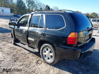 2005 GMC Envoy SLE with VIN 1GKDS13S152246568, listed as a IAAI auction lot 41293887 with 315,882 mi miles. Bid and sale history available at carsss.com. Image 3.