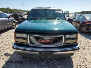 1999 GMC Yukon with VIN 1GKEC13R8XJ792078, listed as a Copart auction lot 50903294 with 232,672 mi miles and Salvage Title. Bid and sale history available at carsss.com. Image 5.