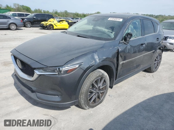 2018 Mazda CX-5 Grand Touring z VIN JM3KFBDM5J0365380, wystawiony jako Copart lot #51040914 z przebiegiem 88 928 mil mil oraz Czysty tytuł • Clean title. Historia ofert i sprzedaży dostępna na DreamBid. Obrazek 1.