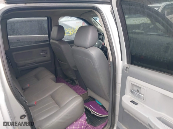 2005 Dodge Dakota Laramie with VIN 1D7HE58N05S244878, listed as a IAAI auction lot 41662513 with 171,323 mi miles. Bid and sale history available at carsss.com. Image 8.