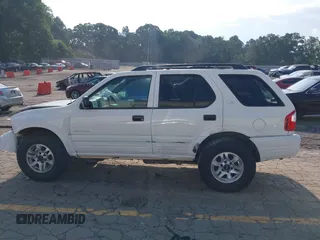2002 Isuzu Rodeo S with VIN 4S2CK58W524321108, listed as a IAAI auction lot 42352330 with 270,614 mi miles and . Bid and sale history available at DreamBid. Image 15.