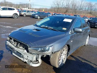 2008 Mitsubishi Lancer Evolution GSR with VIN JA3AW86V18U044077, listed as a IAAI auction lot 41208625 with 157,788 mi miles. Bid and sale history available at carsss.com. Image 18.