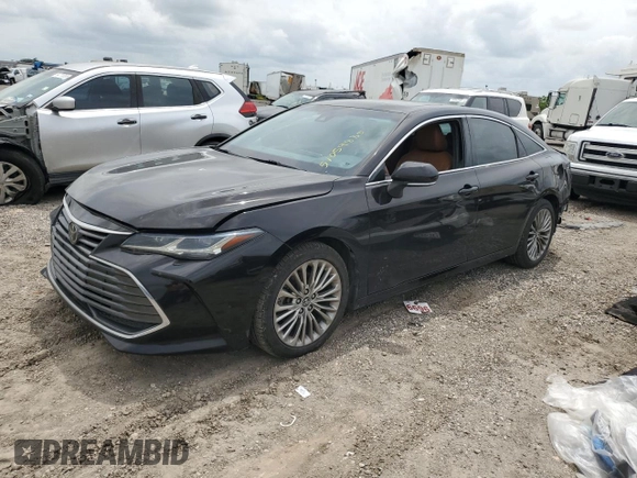 2019 Toyota Avalon XLE with VIN 4T1BZ1FB1KU003493, listed as a Copart auction lot 51059885 with 214,160 mi miles and Salvage Title. Bid and sale history available at carsss.com. Image 1.