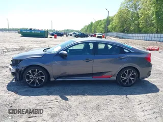 2019 Honda Civic Sport with VIN 2HGFC2F85KH576547, listed as a IAAI auction lot 42024497 with 86,468 mi miles and . Bid and sale history available at DreamBid. Image 14.