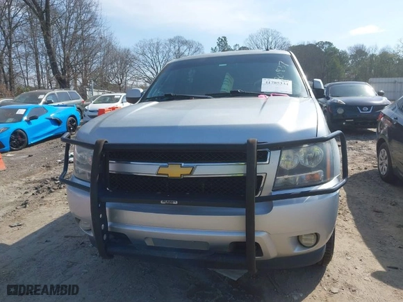 2013 Chevrolet Suburban LS with VIN 1GNWKLEGXDR305591, listed as a IAAI auction lot 41785334 with NaN miles. Bid and sale history available at carsss.com. Image 12.
