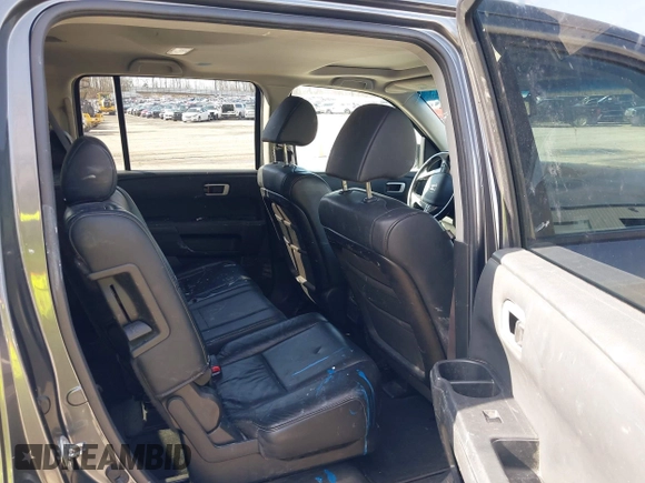 2011 Honda Pilot EX-L with VIN 5FNYF4H51BB065906, listed as a IAAI auction lot 41956370 with 233,977 mi miles and . Bid and sale history available at DreamBid. Image 8.