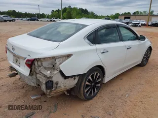 2018 Nissan Altima S with VIN 1N4AL3AP9JC128686, listed as a IAAI auction lot 42038517 with 159,024 mi miles and . Bid and sale history available at DreamBid. Image 4.